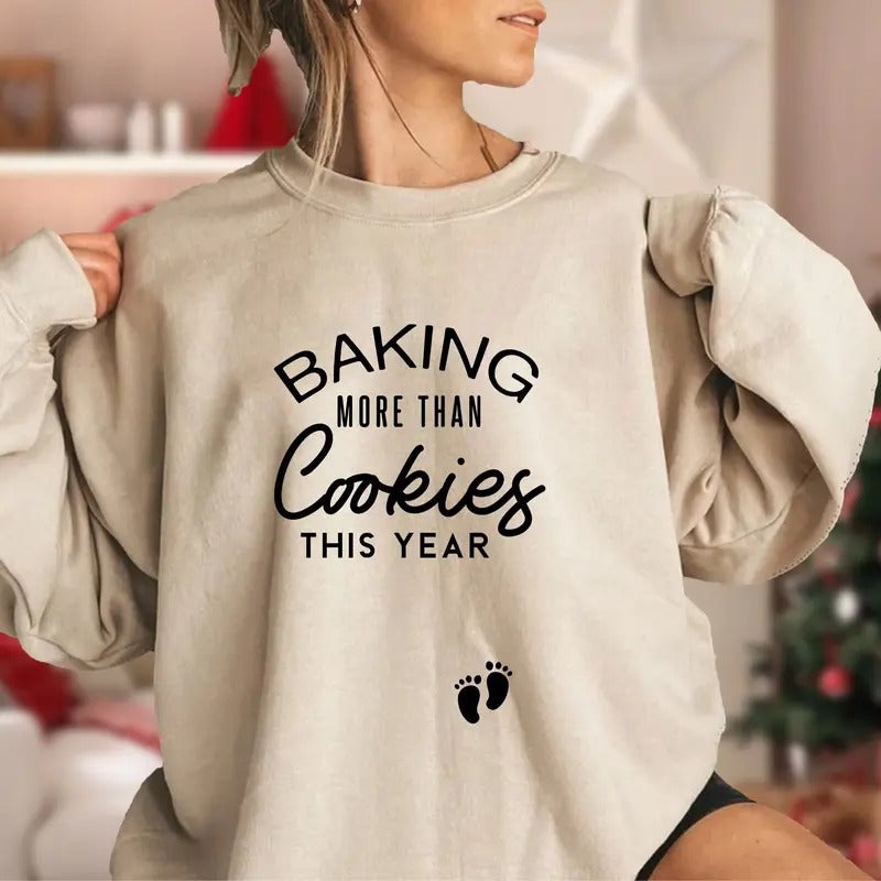 Baking More Than Cookies This Year Shirt, Christmas Pregnancy Sweatshirt, Pregnancy Announcement Shirt, Christmas...