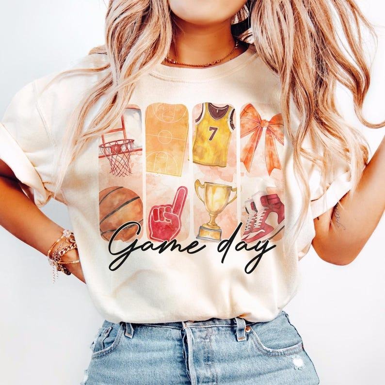 Basketball T-shirt, Game Day Coquette, Bow, Mama, Brushstroke Basketball Hoodie, Sweatshirt | TeeBloomCo.com