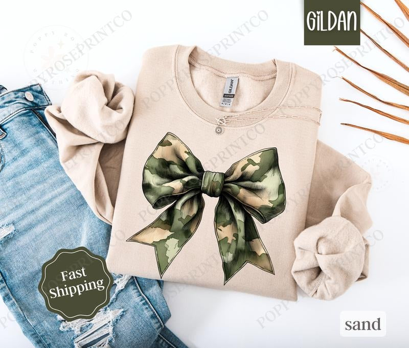 Camo Bow Sweatshirt, Military Wife Sweater, Coquette Bow Women's Crewneck T-Shirts, Hoodie | TeeBloomCo.com