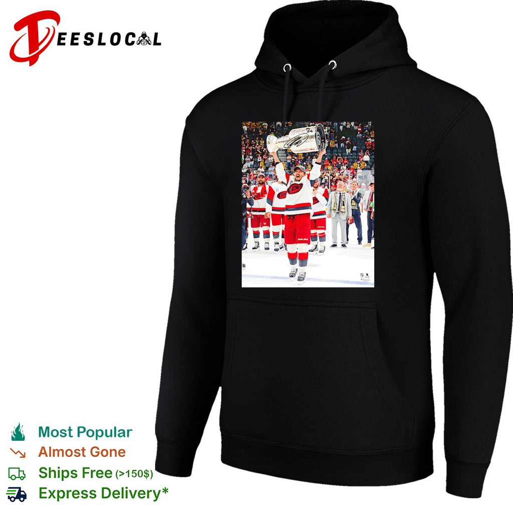Carolina Hurricanes player hoisting Stanley Cup trophy supreme moment photo shirt