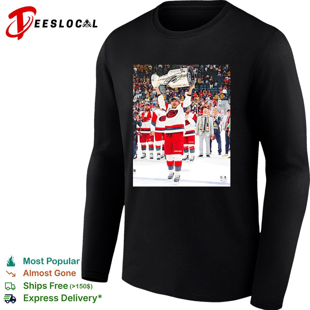 Carolina Hurricanes player hoisting Stanley Cup trophy supreme moment photo shirt
