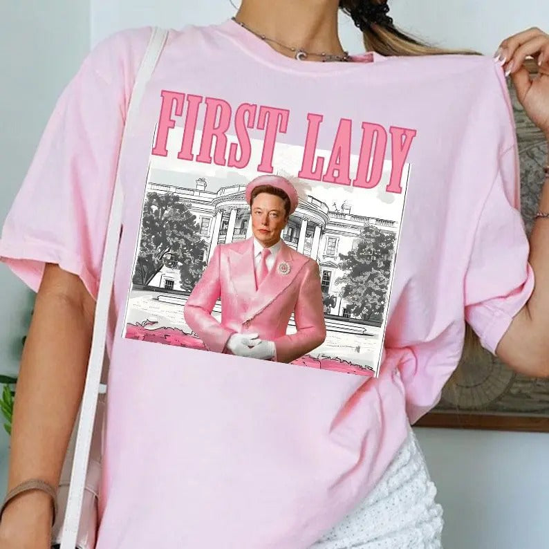 El0n M.u.s.k First Lady 2024 shirt - Unisex Heavy Cotton Tee - Comfort, Basic Hoodie, Sweatshirt | TeeBloomCo.com