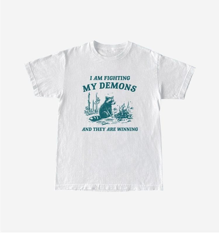 Funny Meme Shirt, I Am Fighting My Demons Tee, Raccoon Gift Unisex T-Shirt Hoodie, Sweatshirt | TeeBloomCo.com