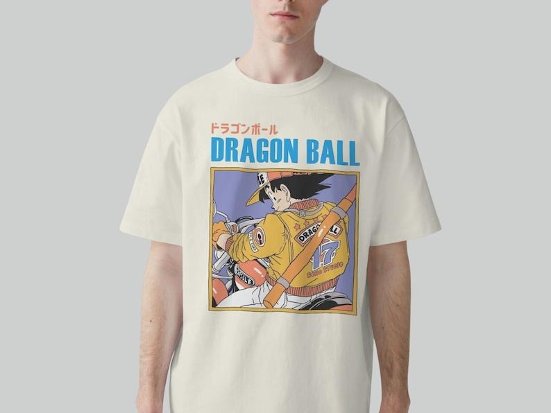Goku Riding a Bike Graphic T-Shirt Hoodie, Sweatshirt | TeeBloomCo.com