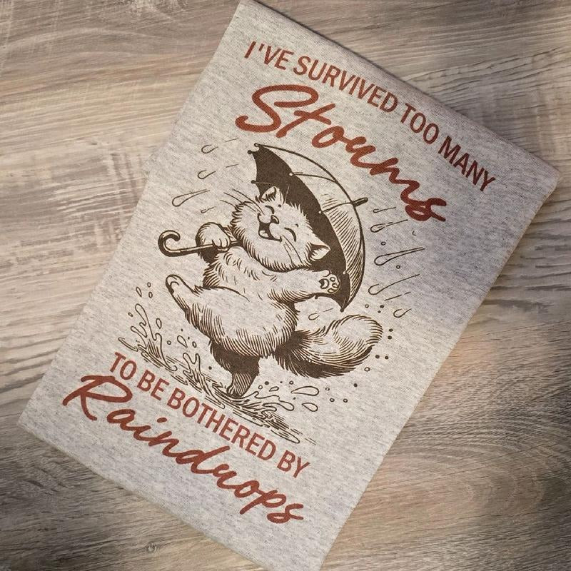 I've survived too many storms to be bothered by raindrops Graphic Tee or Sweatshirt Hoodie | TeeBloomCo.com