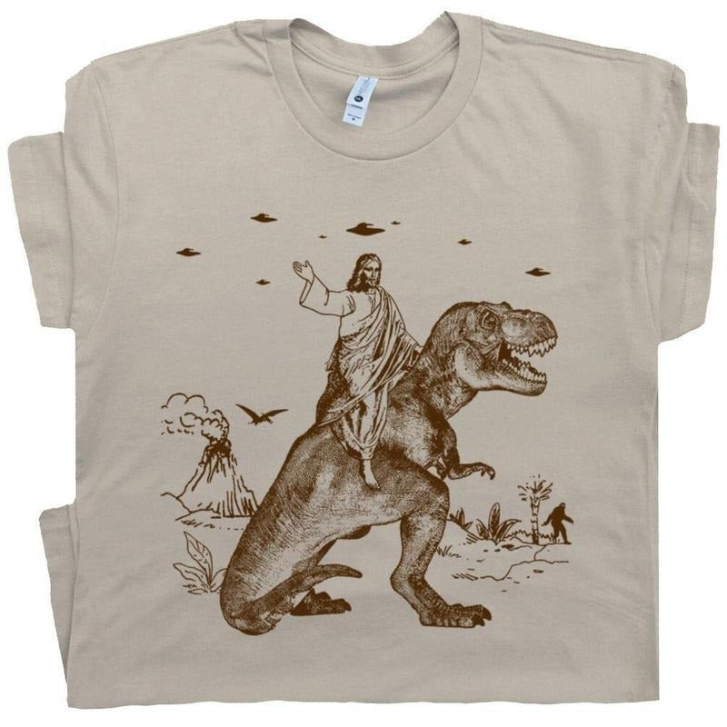 Jesus Riding Dinosaur T Shirt UFO T Shirt Funny T Shirts Offensive T Shirt Cool Graphic T Shirts Crazy Shirts For Men...