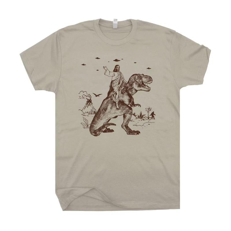 Jesus Riding Dinosaur T-Shirt, Funny T-Shirts Sweatshirt, Gift for Women Hoodie | TeeBloomCo.com