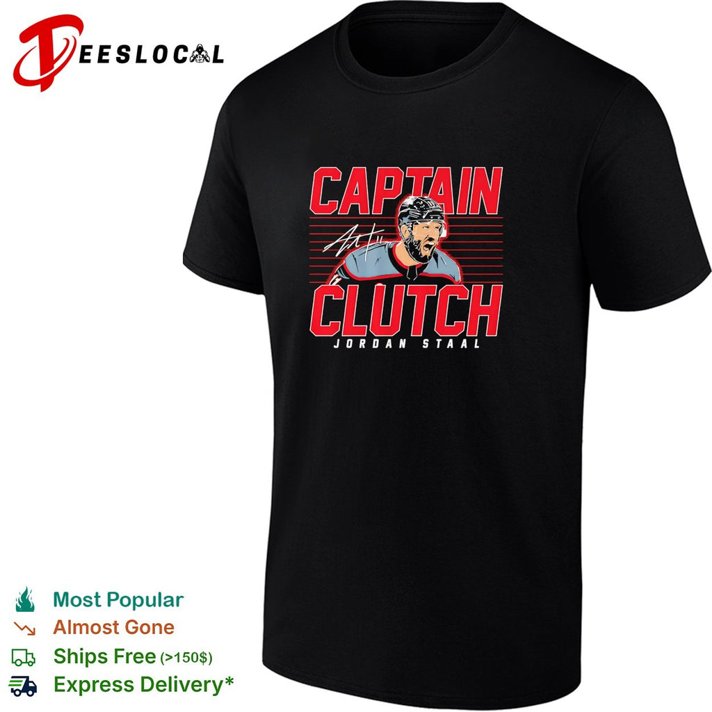 Jordan Staal captain clutch Carolina Hurricanes hockey action portrait bold shirt