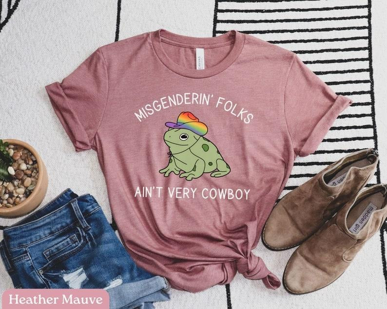 LGBTQ Pride Shirt, Trans Pride Shirt, Nonbinary Pride, Misgendering Folks Aint Very Cowboy, Pride Frog Funny Pride Shirt,...