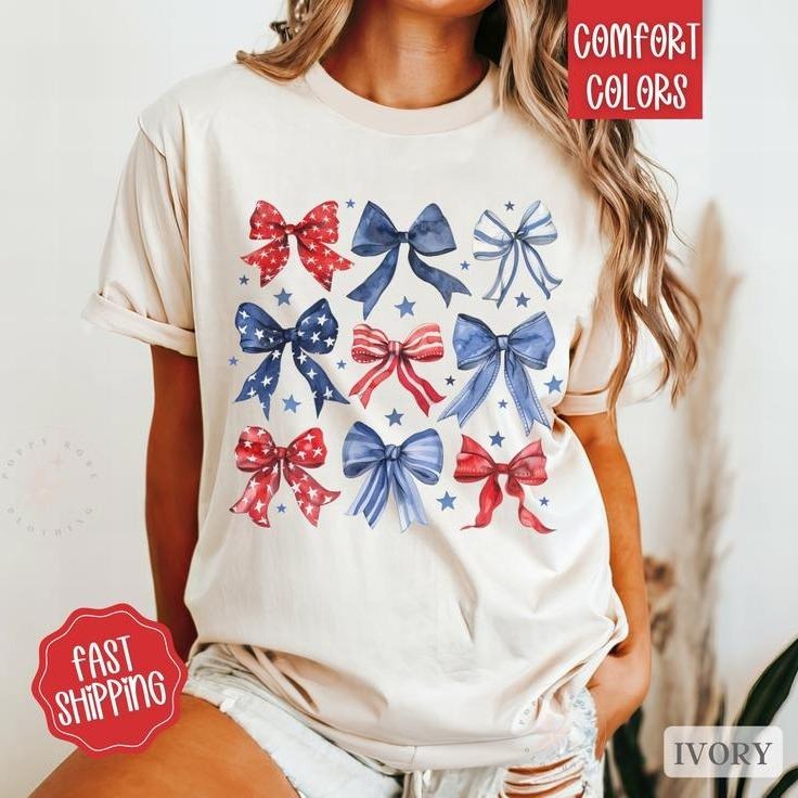 Victoria Maxwell, Womenswear/Menswear Graphic T Shirt USA Bow Shirt Comfort Colors, America Bow Shirt for July 4th,...