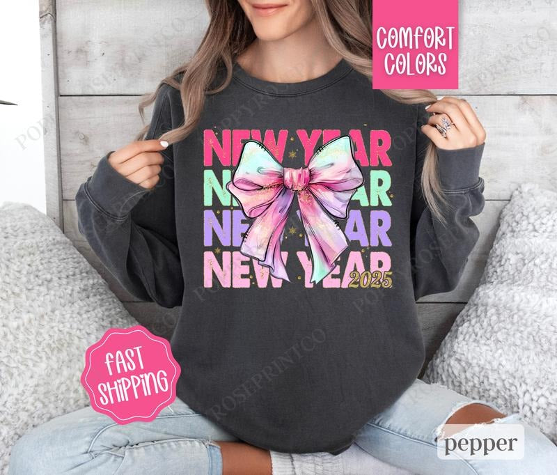 New Year Bow Sweatshirt Comfort Colors, NYE 2025 Crewneck, Happy New Year Sweater T-Shirts, Hoodie | TeeBloomCo.com