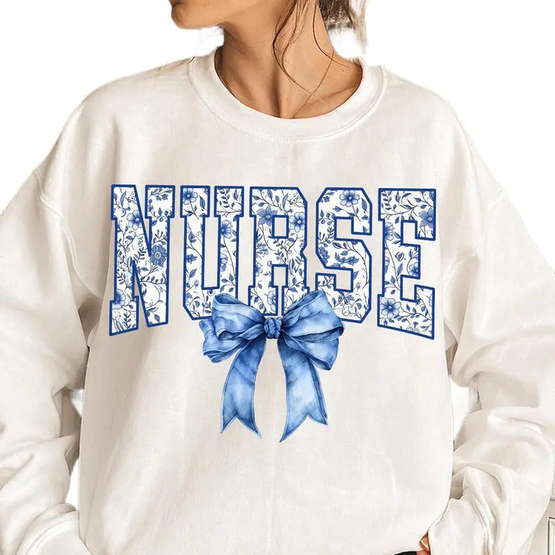 Nurse Floral Color Coquette Bow Sweatshirt, Funny Nurse Shirt, Nurse Coquette Bow Hoodie, Girly Nursery Gift , Unisex...