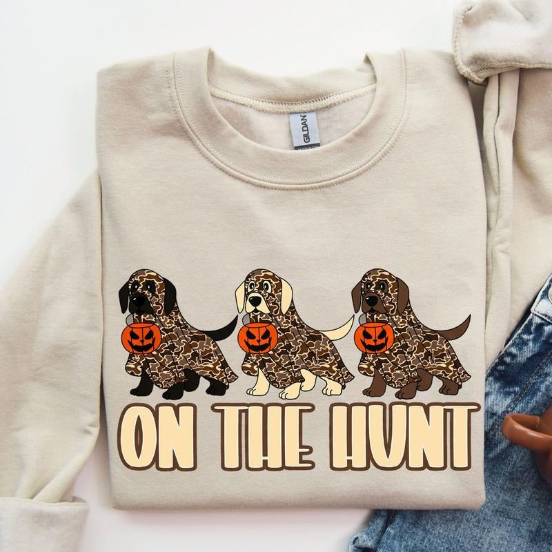 On The Hunt Camo Halloween Dogs Unisex Crewneck Sweatshirt, Hunting Dog Shirt, Camo Hunting Pumpkin Tee, Halloween Gift...