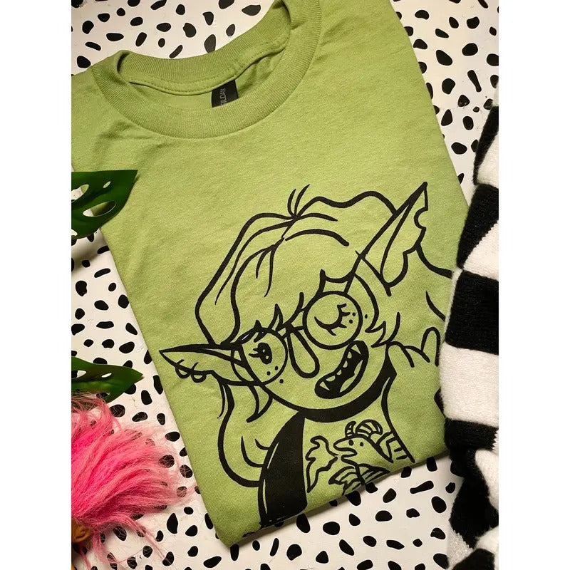Orc girl on avocado green unisex shirt. Printed in Long Beach, CA. Hoodie, Sweatshirt | TeeBloomCo.com
