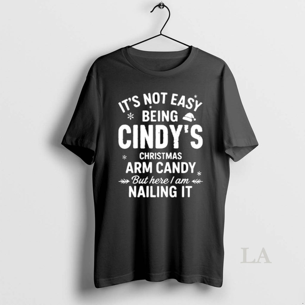 Original Its Not Easy Being Cindys Christmas Arm Candy But Here I Am Nailing It T-Shirts, Hoodie, Sweatshirt | TeeBloomCo.com