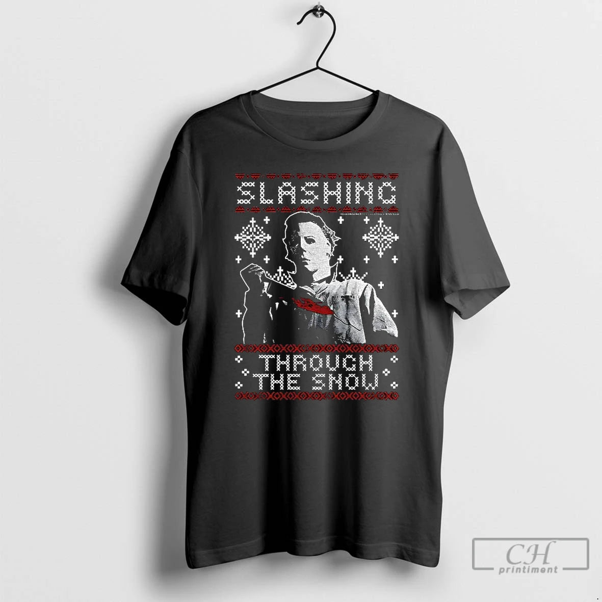 Premium Michael Myers Slashing Thru The Snow Christmas T-Shirts, Hoodie, Sweatshirt | TeeBloomCo.com