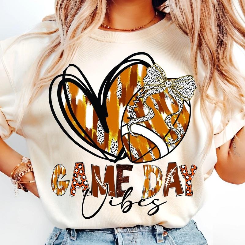 [Sale To 45% Off] Football Game Day T-Shirt, Coquette Bow Football Mom T-Shirt, Retro Football Vibes, Gift For Mom,...