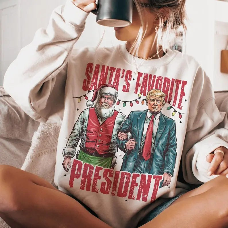 Santa's favorite president  Sweatshirt - Trump Christmas Sweatshirt Womenswear Fit T-Shirts, Hoodie | TeeBloomCo.com