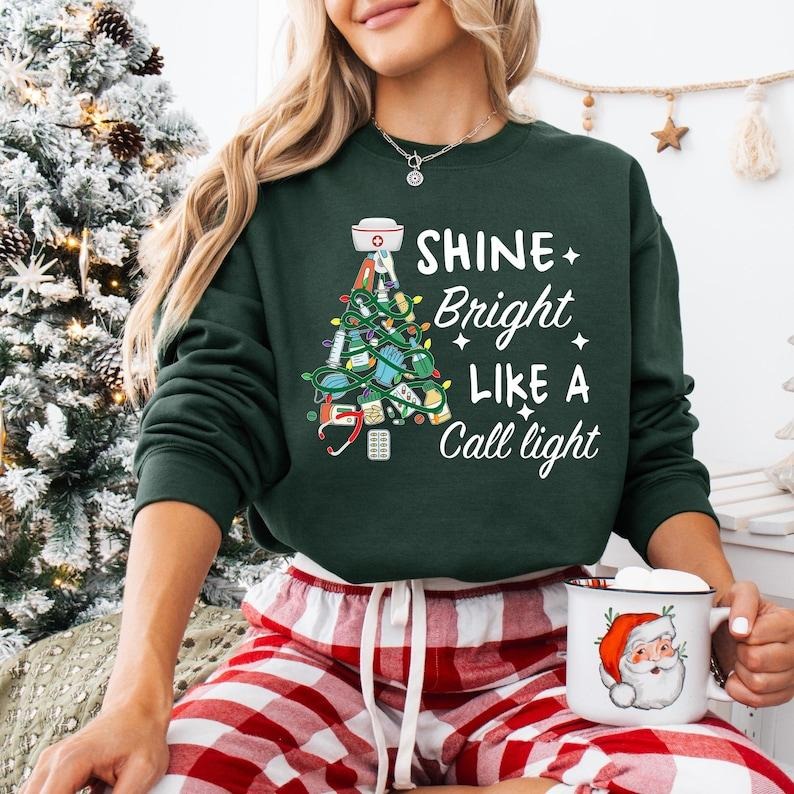 Shine Bright Like A Call Light Sweatshirt, Nurse Christmas T-shirt, ICU ER Rn Nurse Tee, Christmas Nursing School Hoodie,...