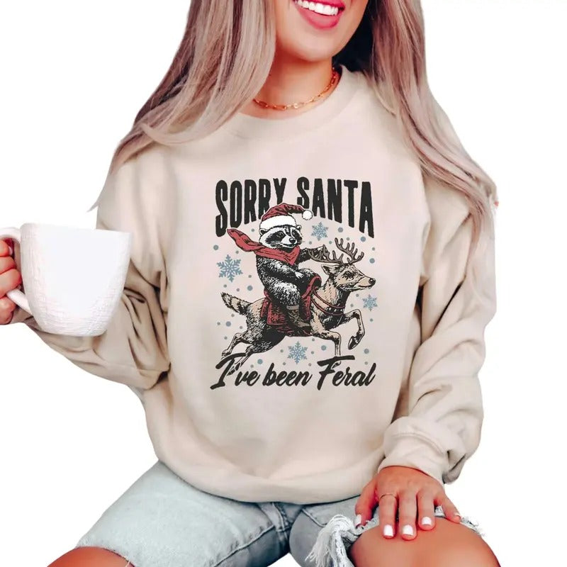 Sorry Santa I've been Feral Sweatshirt, Funny Christmas Shirt, Christmas Season Feral Raccoon Shirt Hoodie | TeeBloomCo.com