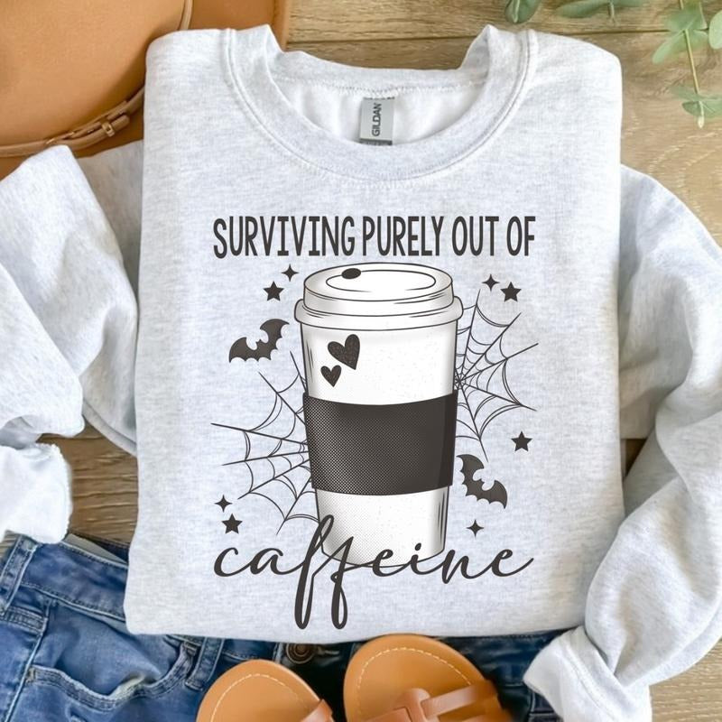 Surviving purely out of caffeine Sweatshirt - Ash Grey - Halloween Sweatshirt T-Shirts, Hoodie | TeeBloomCo.com