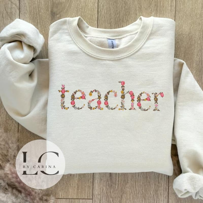 "Teacher" Floral Embroidered Sweatshirt - Stylish Educator Apparel - Custom Floral Design - Cozy Teacher Jumper T-Shirts,...