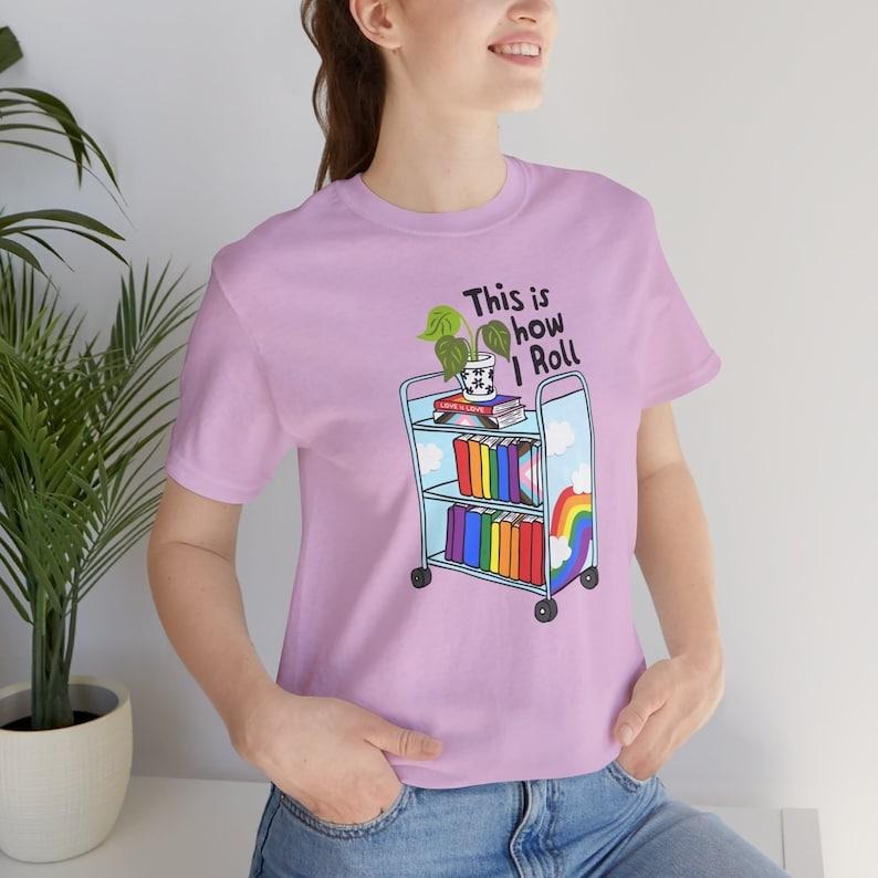 This Is How I Roll Pride Shirt, LGBTQIA Library T-Shirt, Queer Bookish Apparel, Librarian Gift Hoodie, T-shirt and...