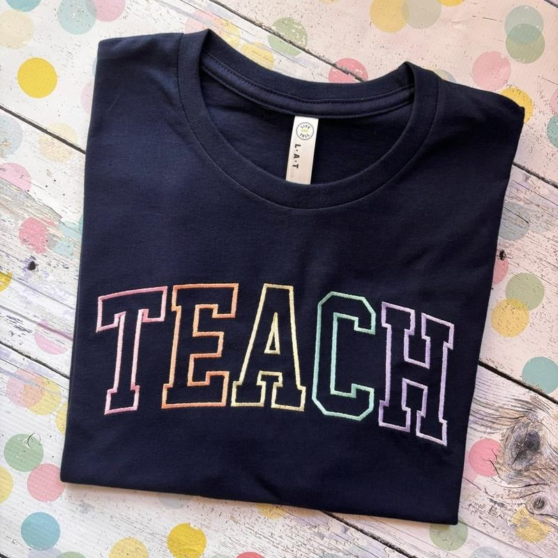 Varsity Teach Tee Teacher Shirt Navy Pastel Hoodie, Sweatshirt | TeeBloomCo.com
