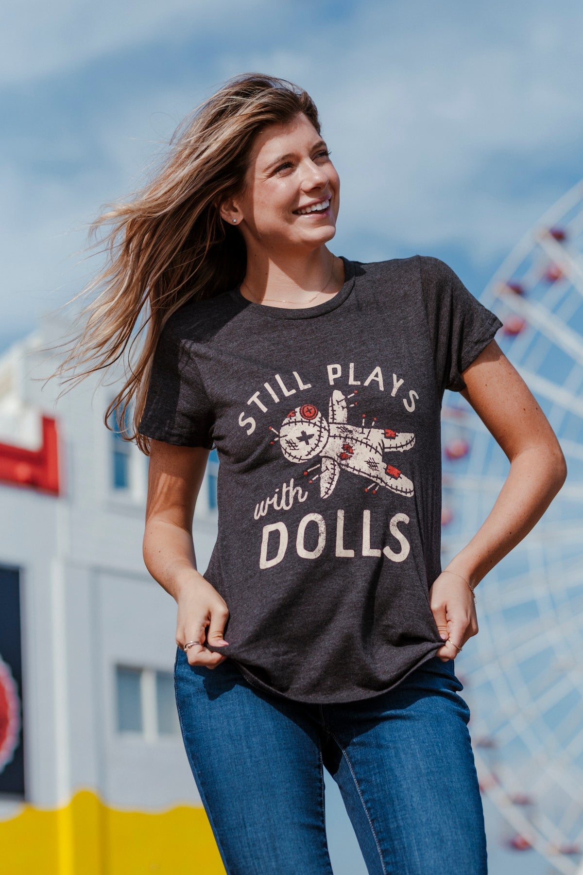 Still Plays With Dolls Women's T Shirt