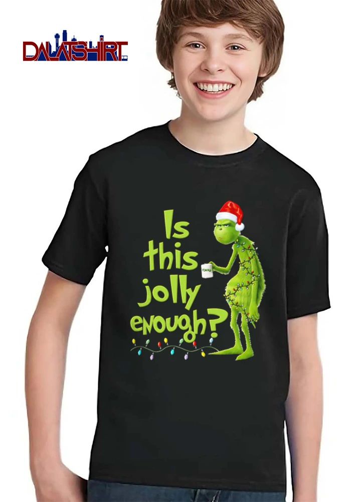 Is This Jolly Enough green furry creature Santa hat holding mug wrapped in Christmas lights shirt