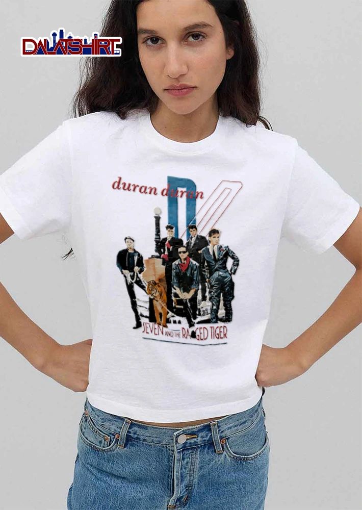 Duran Seven AND THE Ragged Tiger band members posing with shirt