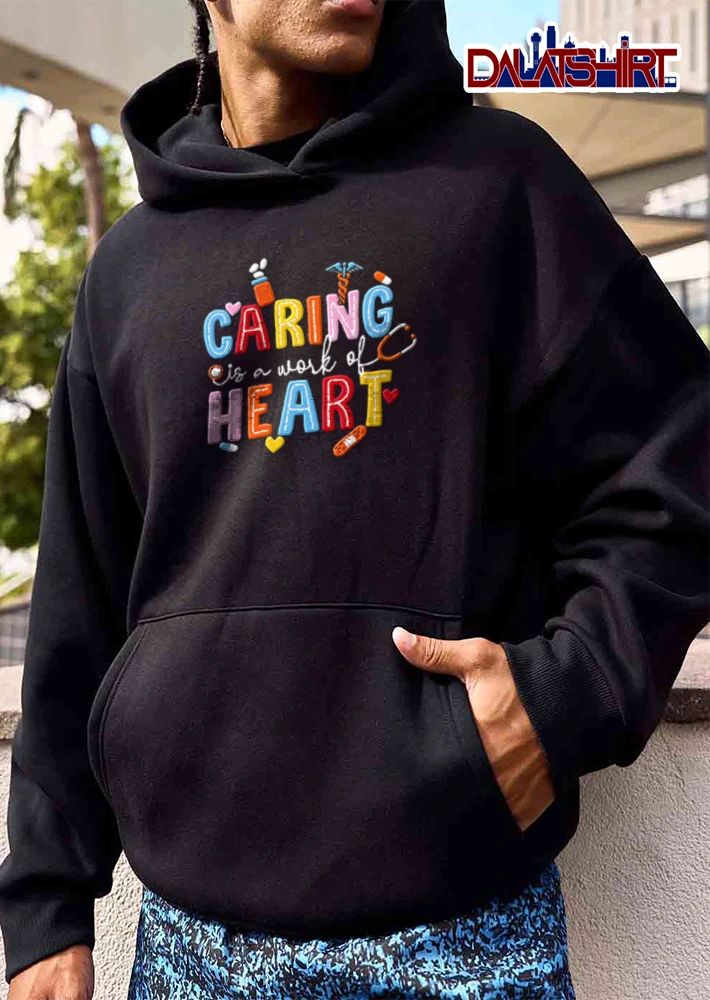 Caring Is A Work Of Heart medical icons stethoscope bandage pills shirt