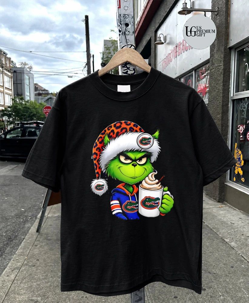 Grinch Florida Gators holding mug Christmas Holiday 2026 shirt
