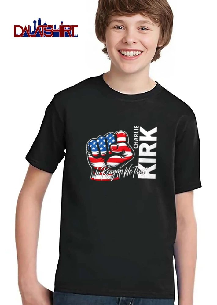 Charlie Kirk In Reagan We Trust American flag patterned fist raised shirt