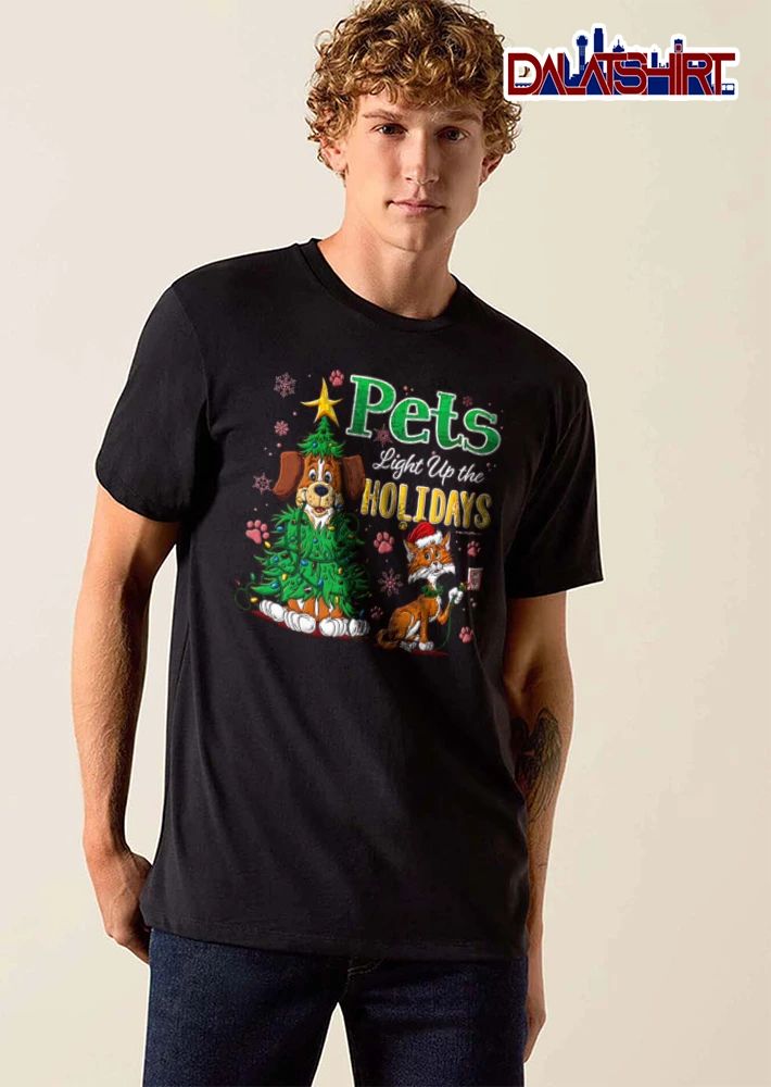 Pets Light Up The Holidays dog wrapped in lights cat plugging in shirt